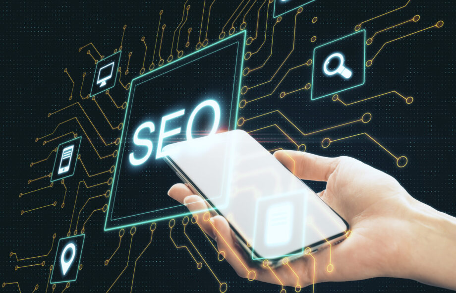 hand-holding-smartphone-with-creative-digital-seo-2025-10-15-02-05-33-utc