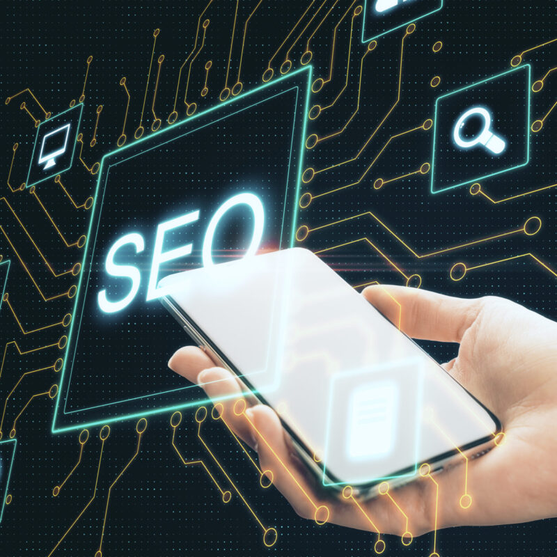 hand-holding-smartphone-with-creative-digital-seo-2025-10-15-02-05-33-utc